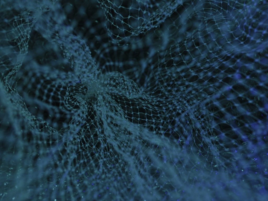 Digital mesh illustrating a new technical committee launched by ETSI that aims to address the challenges of modern data ecosystems in the IoT sector and beyond, especially with the growth of AI.