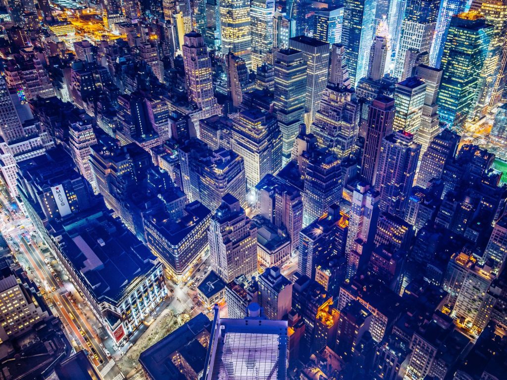 Buildings at night as smart deployments are moving beyond pilots as operational leaders prioritise ROI and scalable infrastructure.
